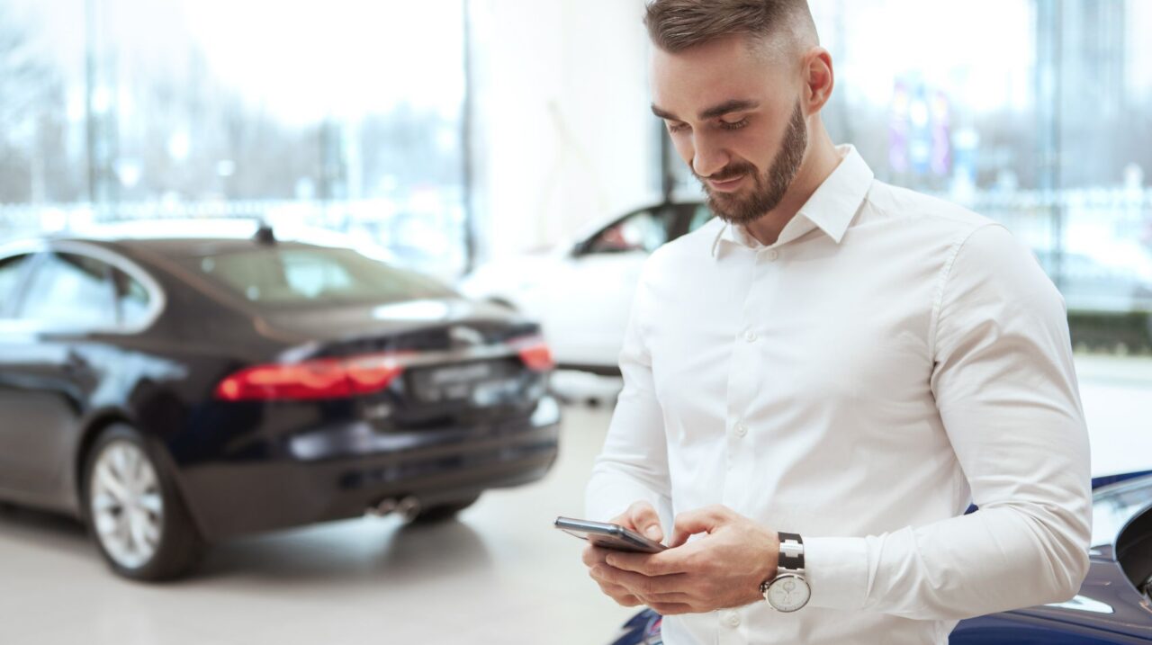 a man looking at a cellphone