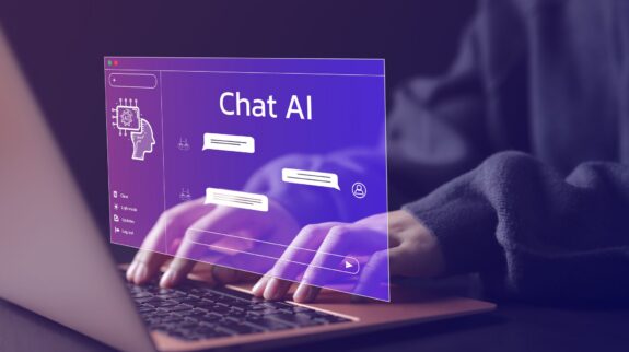 chat_ai a person typing on a laptop