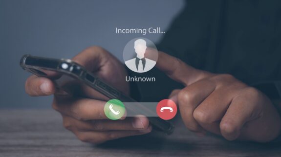 declining_call a person holding a phone