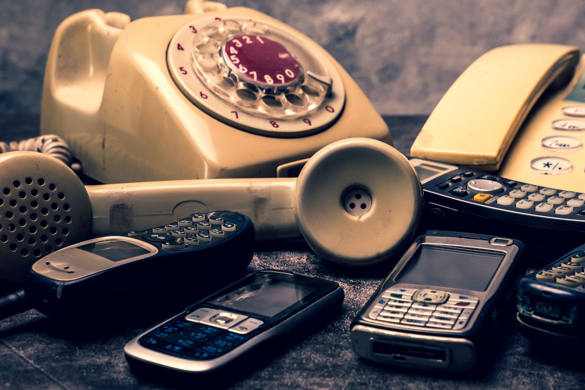 a group of old phones