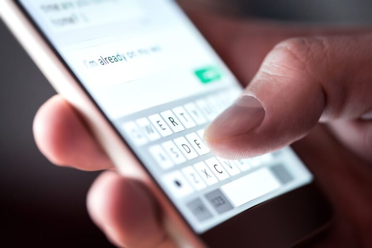 A Person Using A Phone