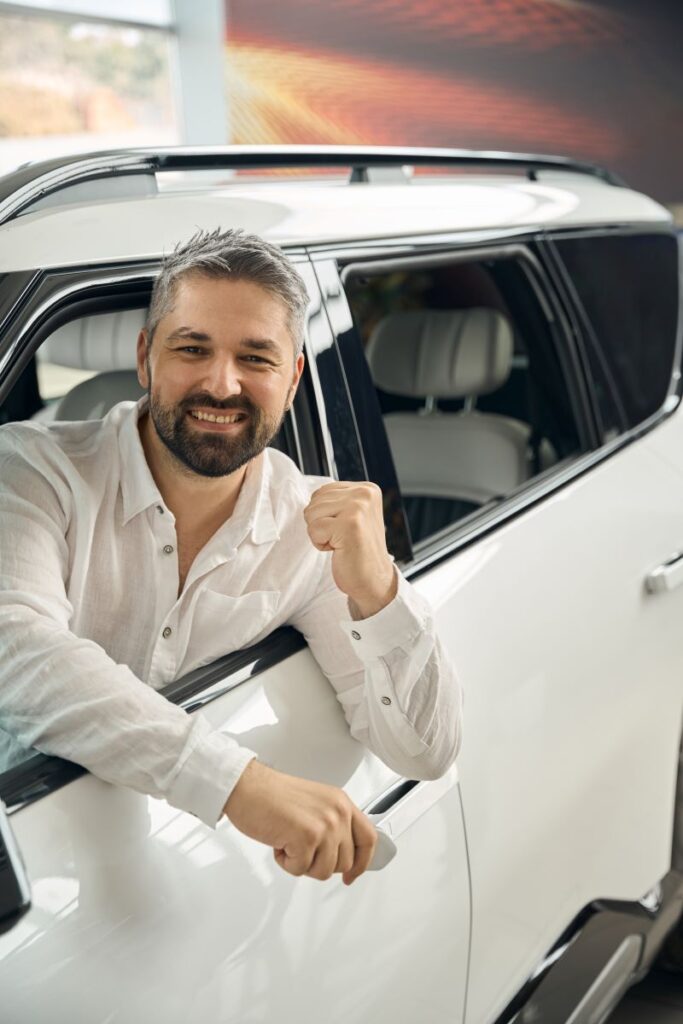 Lead Nurturing Tactics That Actually Work For Automotive Sales 2 Happy Man Holding New Car Keys