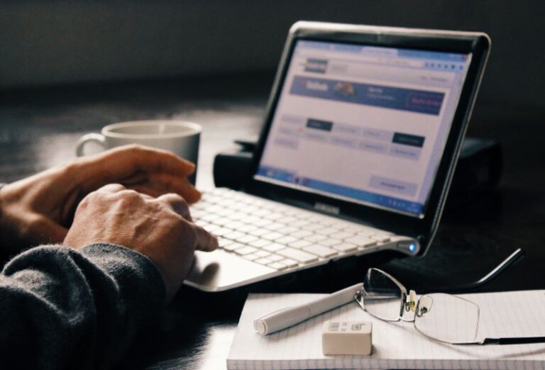 Man Works On A Sms Marketing Software