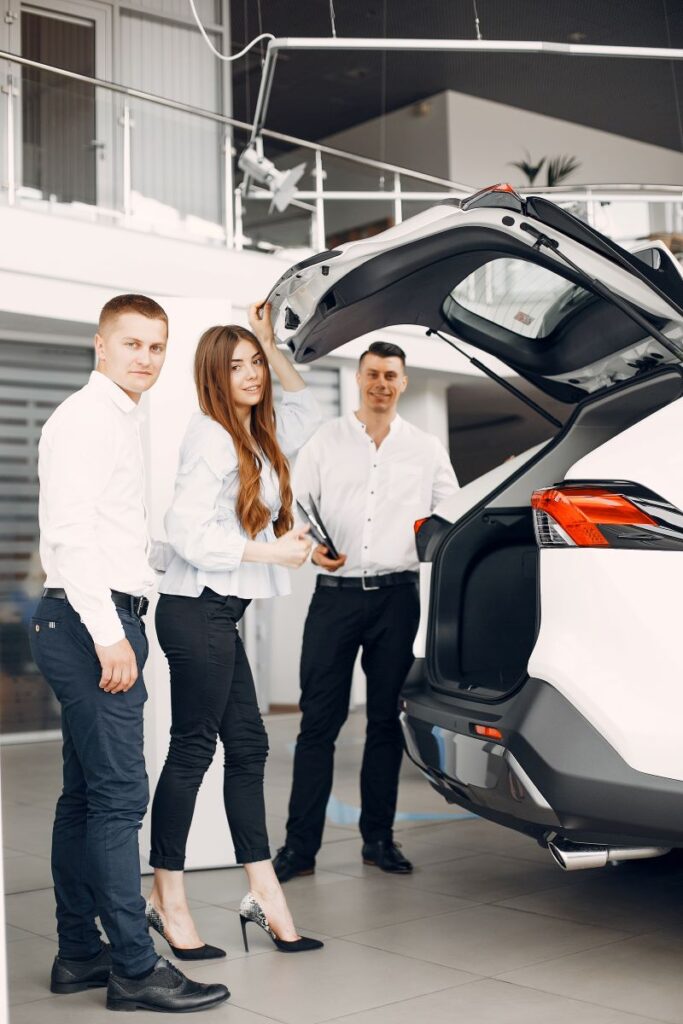 People In A Car Salon