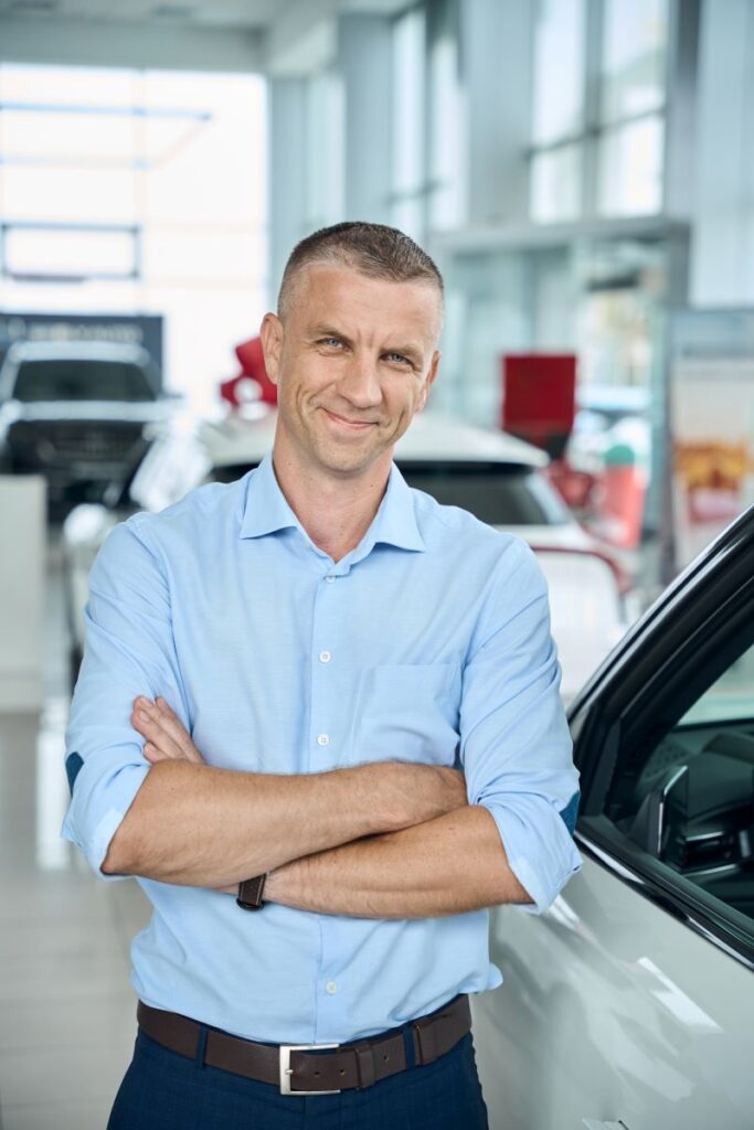 Smiling Car Dealer