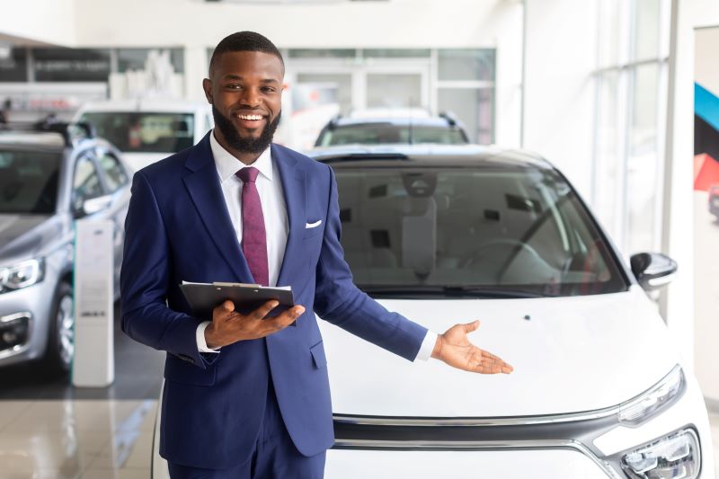 Manager Talking About Car