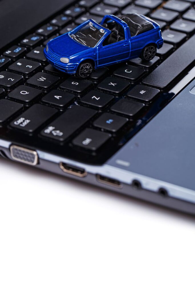 How Automotive Software Improves Customer Experience &Amp; Retention 1 Toy Car Over Keyboard