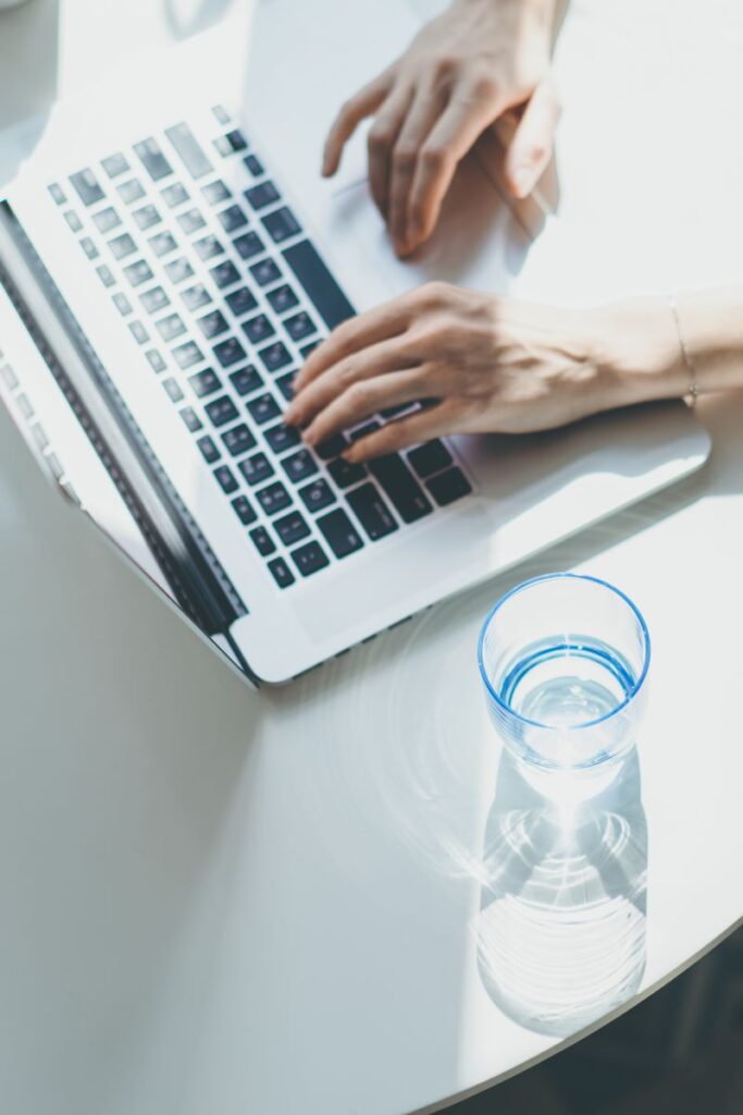 The Future Of Automotive Software: Ai, Automation, And Smarter Sales Tools 1 Working At Home Young Woman Typing On Laptop