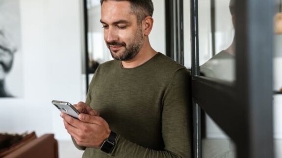 business man reading follow up message