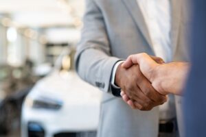 car salesman and client