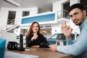 car showroom salesman and client that came through automated software